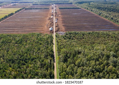 Aerial View Of Peat Harvesting Field. Peat Extraction