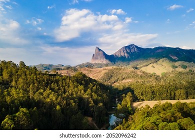 Aerial view of Pedra Azul, with vegetation, houses, village and church. In the mountain region of Domingos Martins in Espírito Santo, Brazil.