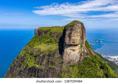 Aerial View Of Pedra Da Gávea In Rio De Janeiro Using A Drone, With A Beautiful Sky And Blue Sea