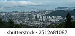 An aerial view of Penang island, travel destinations, downtown district, cityscape or landscaped from Penang hill, Malaysia, panoramic skyscraper. tower and apartment.