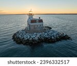 Aerial view of Penfield Reef Lighthouse on Long Island Sound at sunset Fairfield, CT