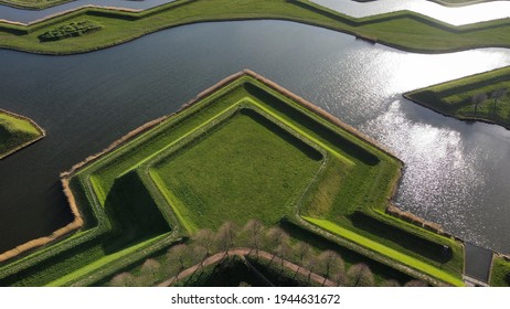 Aerial View Of A Pentagon Shaped Grass Field That Was Used As Defense Walls