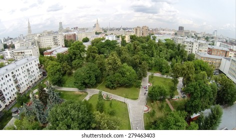 Aerial View Of People Walk By Park Named By Bauman With Small Playground At Summer Day.