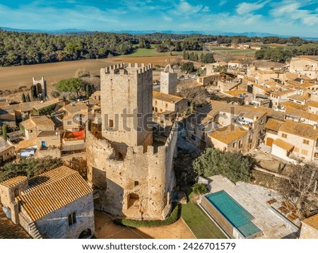 Aerial view of Peratallada, historic artistic small fortified medieval town castle in Catalonia, Spain near the Costa Brava. Stone buildings rutted stone streets and passageways.