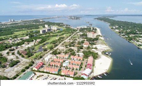 Aerial view of Perdido Key with the skyline of Pensacola beach also off in the distance.