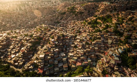 Aerial view of Petare Slum, in Caracas, Venezuela, during a sunset 