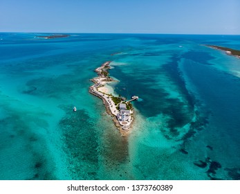 Aerial view photo of the beautiful Pearl Island in the Bahamas near Nassau, showing the beach and lighthouse of the island. - Shutterstock ID 1373760389