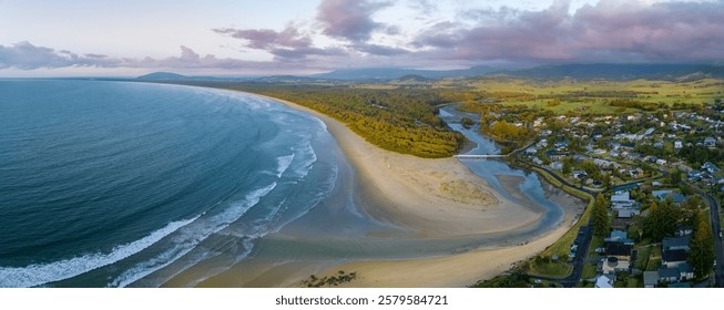 Aerial view of a picturesque beach with white sand, aquamarine water, and beachfront homes nestled among the shoreline - Powered by Shutterstock - Get 15% off with code: PIKWIZARD15