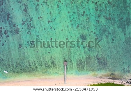 Aerial view of a pier at St. Felix beach located in the south of Mauritius island