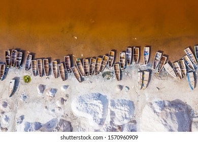 Aerial View Of The Pink Lake Retba Or Lac Rose In Senegal. Photo Made By Drone From Above. Africa Natural Landscape.