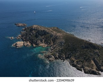 Aerial View Of Plage Ranc And Cap Taillat In French Riviera, Near Saint-Tropez. Beautiful Rocky Beach Near Coastal Path With Luxury Yachts, Turquoise And Idyllic Water. Drone View From Above France.