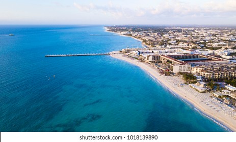 Aerial View Of Playa Del Carmen, Mexico Showing Luxury Resorts And Blue Turquoise Beach During Sunrise