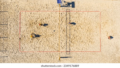 Aerial view of playing volleyball. Top view of the volley ball court during game. - Powered by Shutterstock