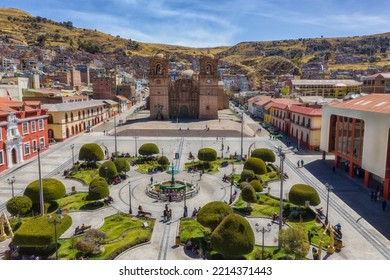 Aerial view of Plaza de Armas in Puno on Lake Titicaca in Peru, after the conversion of the monument to Francisco Bolognesi for an old French fountain from the end of the 19th century.