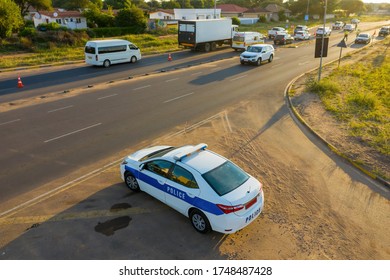 Aerial View Of A Police And Ambulance Car At A Road Block, In Africa , Botswana