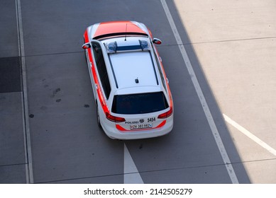 Aerial View Of Police Car At Zürich Airport On A Sunny Spring Day. Photo Taken March 26th, 2022, Zurich, Switzerland.