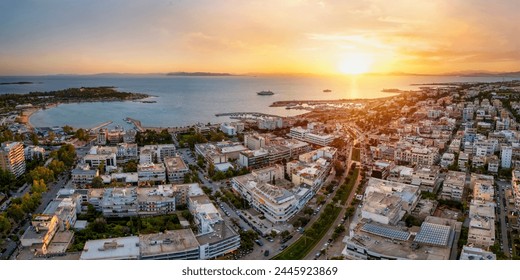 Aerial view of the popuar shopping district of Glyfada, South Athens Riviera, Greece, during a golden sunset - Powered by Shutterstock