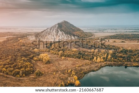 Aerial view of the popular attraction of Bashkortostan - Mount Shikhan, famous for its prehistoric deposits and numerous lakes around