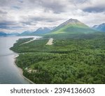 Aerial view of Port Alsworth, Alaska within Lake Clark National Park and Preserve. Private Port Alsworth Airport, public Wilder Natwick Airport, Tanalian Mountain, Chig­mit Mountains, Hardenburg bay.