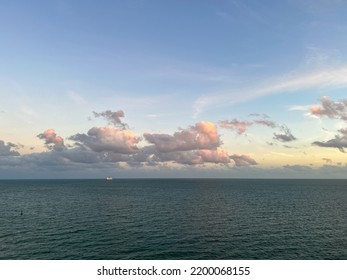 An Aerial View Of  Port Canaveral At Sunset During A Cruise Ship Sail Away In Florida.