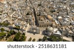 Aerial view of Porta Napoli and the San Luigi Gonzaga church. It is one of the entrances to the historic center of Lecce, Puglia, Italy.