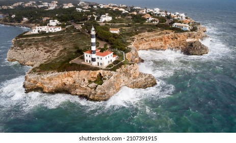 Aerial View Of Porto Colom Lighthouse In Stormy Sea