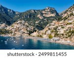 Aerial view of Positano with comfortable beach and blue sea on Amalfi Coast in Campania, Italy. Positano village on the Amalfi Coast, Salerno, Campania. Beautiful Positano, Amalfi Coast in Campania.