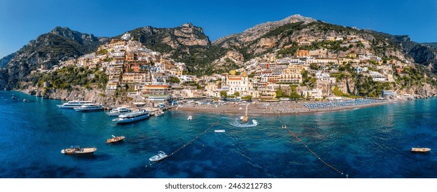 Aerial view of Positano with comfortable beach and blue sea on Amalfi Coast in Campania, Italy. Positano village on the Amalfi Coast, Salerno, Campania. Beautiful Positano, Amalfi Coast in Campania. - Powered by Shutterstock