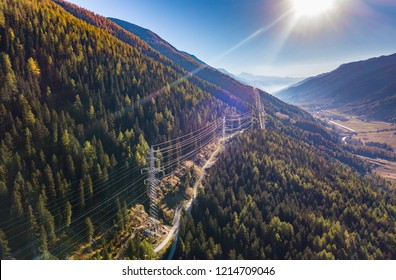 Aerial view of power line pylon in mountaineous area in Switzerland, Europe