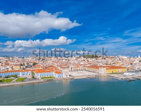 Aerial view of Praca do Comercio and Baixa district in Lisbon old town, Portugal. Panoramic drone photo of central square and Arco da Rua Augusta