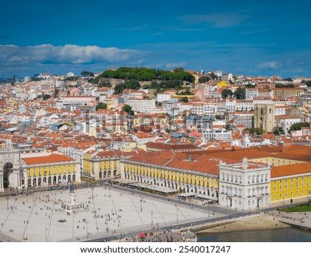 Aerial view of Praca do Comercio and Baixa district in Lisbon old town, Portugal. Panoramic drone photo of central square and Arco da Rua Augusta