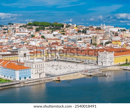 Aerial view of Praca do Comercio and Baixa district in Lisbon old town, Portugal. Panoramic drone photo of central square and Arco da Rua Augusta