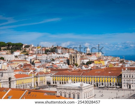 Aerial view of Praca do Comercio and Baixa district in Lisbon old town, Portugal. Panoramic drone photo of central square and Arco da Rua Augusta