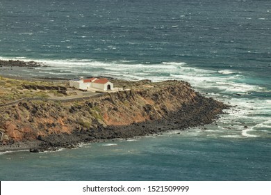 Aerial View Of Punta Llana, Where Is The Ermita De Nuestra Senora De Guadalupe At La Gomera. Hiking Trail Descending To The Coastal Plateau. Long Focus Lens. Canary Islands.