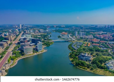 Aerial View Of Putrajaya Lake With Straight Main Road And Putrajaya Bridge View