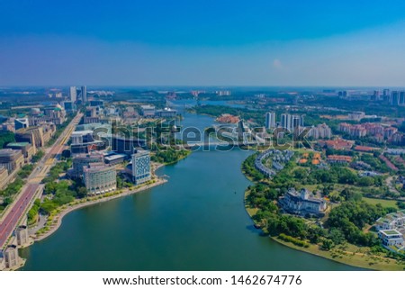 Aerial View Of Putrajaya Lake With Straight Main Road And Putrajaya Bridge View