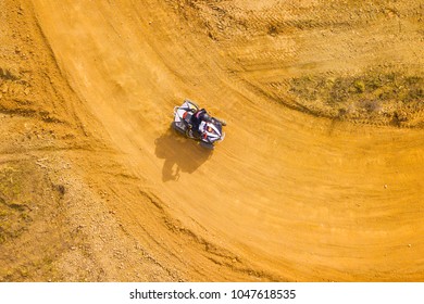 Aerial View Of Quad Bike In Racetrack. Outdoor Motor Sport From Drone View.