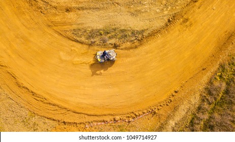 Aerial View Of Quad Bike In Racetrack. Outdoor Motor Sport From Drone View.