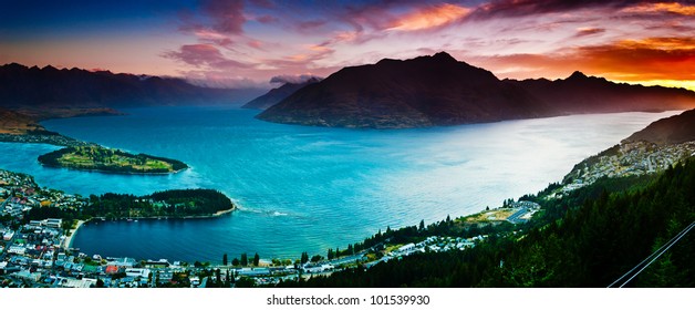 Aerial view of Queenstown with lake Wakatipu at Dusk in panorama