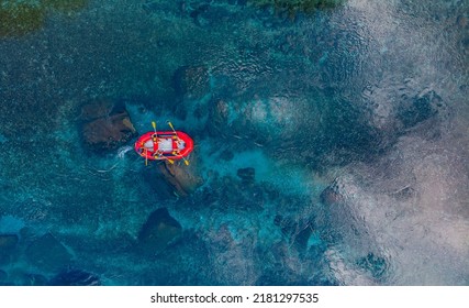Aerial view rafting on red boat on blue river Turkey. Concept adventure extreme travel.