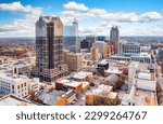 Aerial view of Raleigh, North Carolina skyline on a sunny day.