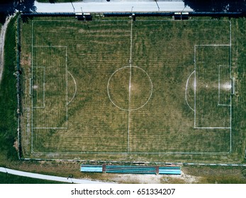 Aerial View Of Real Soccer Pitch, Top View Of Football Sport Field In Drone Pov