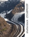 Aerial view of receding glacier landscape in mountains of Denali National Park, Alaska