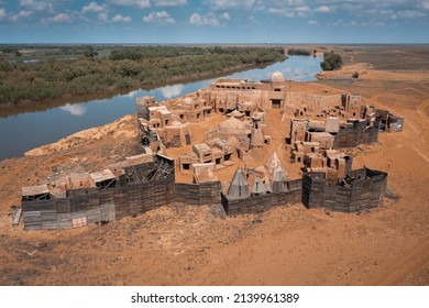 Aerial view of reconstruction of ancient capital city of Mongol warriors from Golden Horde with buildings made of stone, sand and wood - Shutterstock ID 2139961389