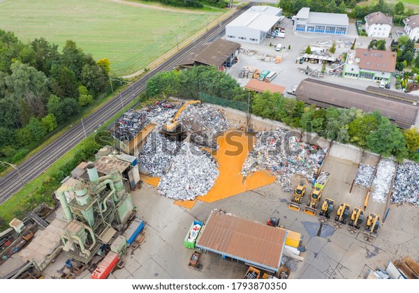 Aerial view of recycling center with sorting of\
raw materials
