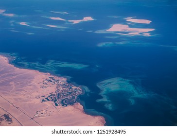 Aerial View Of The Red Sea And The Coast Of Sinai Peninsula, Egypt, Little Islands In The Red Sea; View Of Lagoon Where Hotels Are Located
