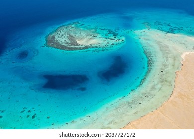 Aerial view: Red sea, corals and  sandy island, Egypt. - Powered by Shutterstock