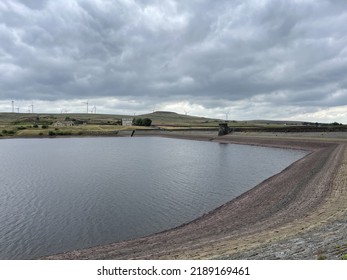 Aerial view of a reservoir with low water levels due to the hot dry weather in the United Kingdom. Taken in Lancashire England.