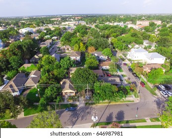 Aerial View Of Residential Houses Neighborhood In Suburban Area Of Downtown Houston, Texas, US. Tightly Packed Homes, Driveway Surrounded With Green Tree Flyover In Early Morning. Housing Development.