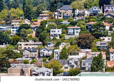 Aerial view of residential neighborhood built on a hill, Berkeley, San Francisco bay, California; 